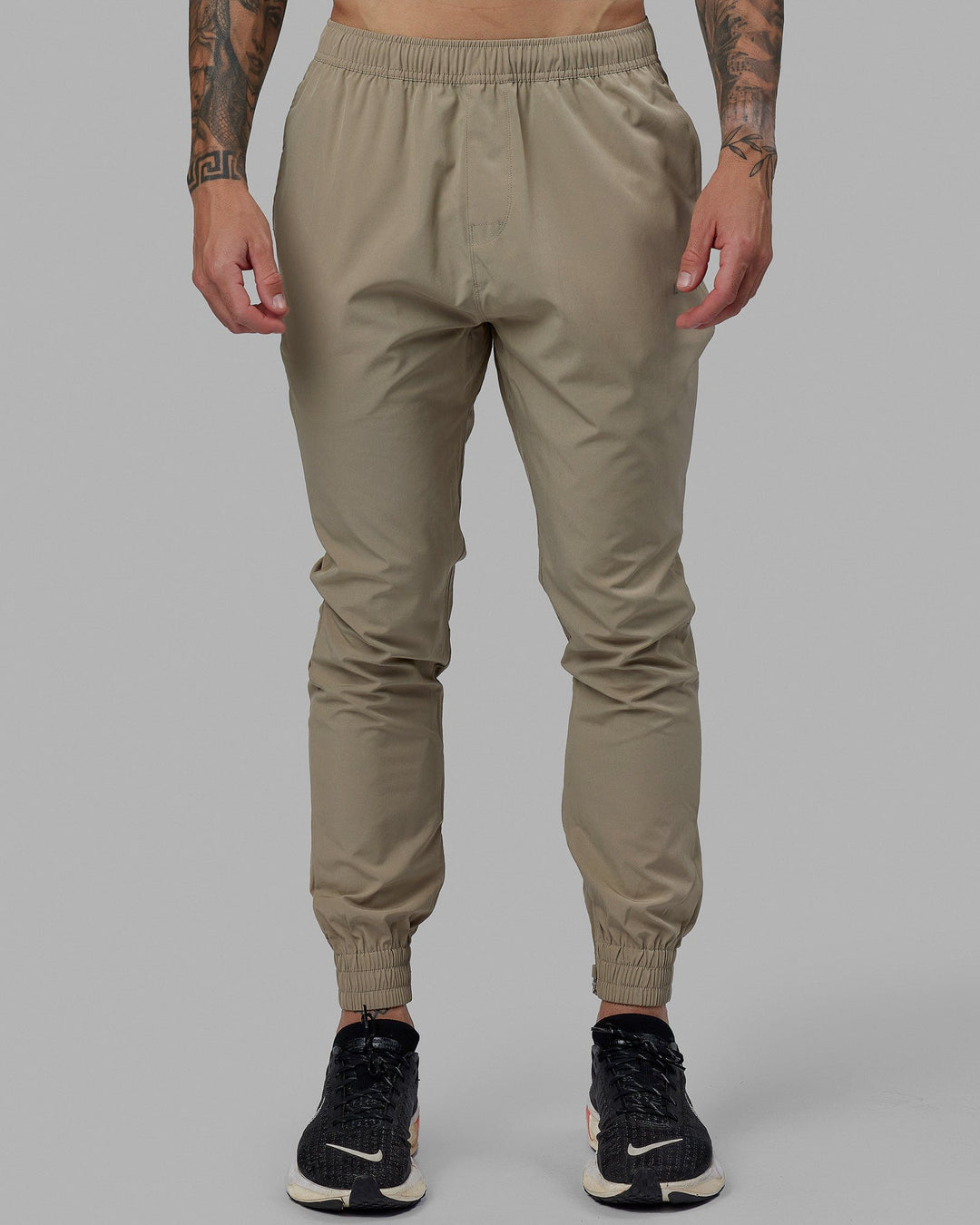 Man wearing Warm Up Zip Cuff Performance Jogger - Laurel Oak