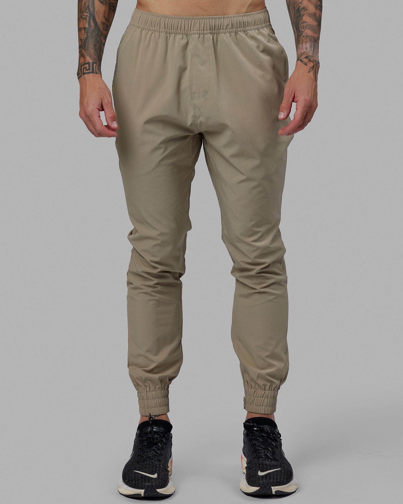Man wearing Warm Up Zip Cuff Performance Jogger - Laurel Oak