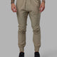 Man wearing Warm Up Zip Cuff Performance Jogger - Laurel Oak
