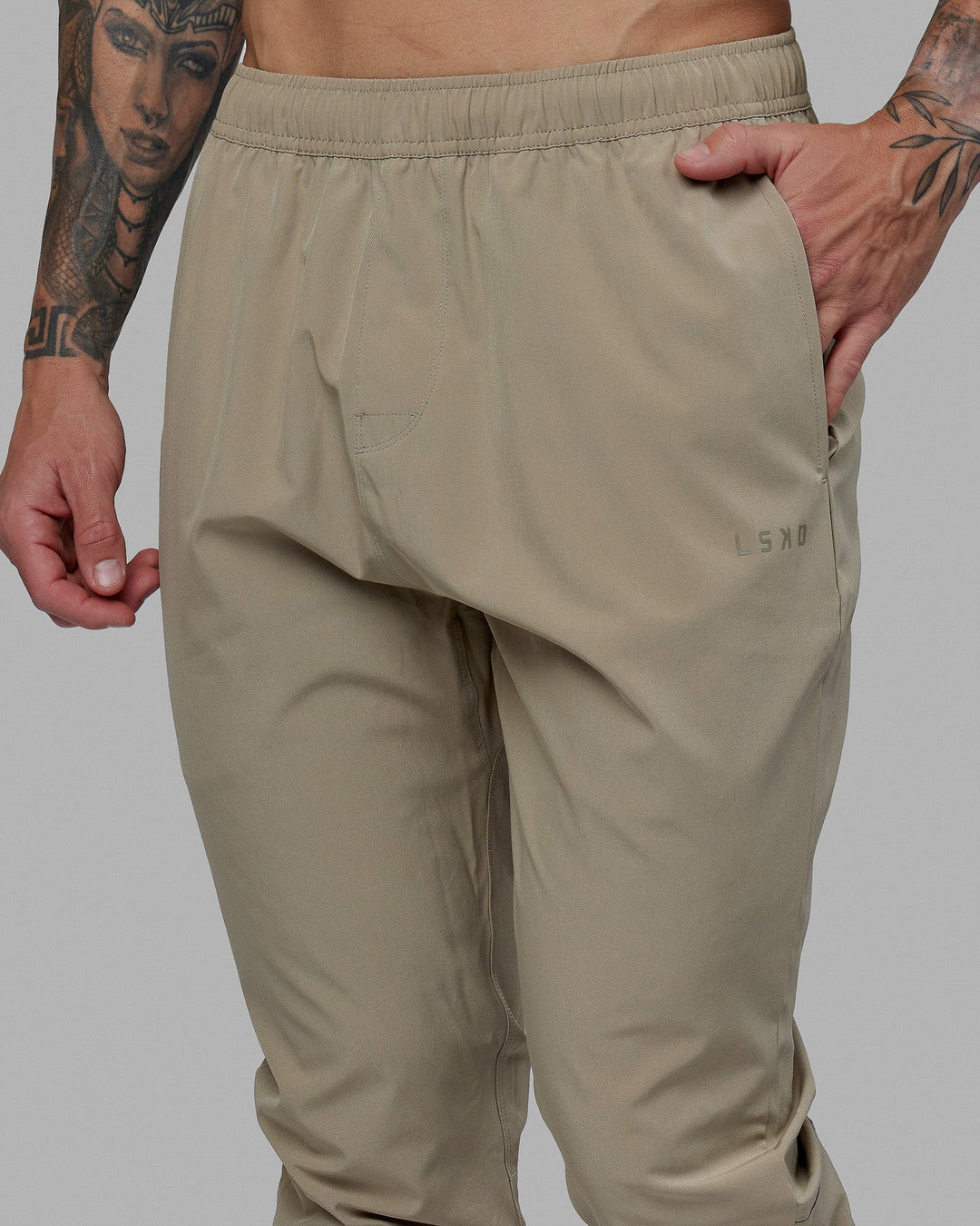 Man wearing Warm Up Zip Cuff Performance Jogger - Laurel Oak