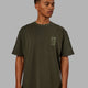 Man wearing Wavy Heavyweight Oversize Tee - Forest Night