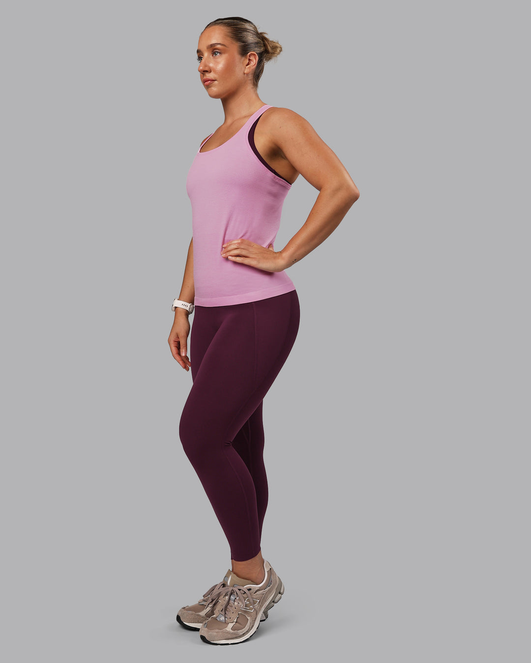 Woman wearing AeroFLX+ Seamless Tank - Bubblegum/Pirouette
