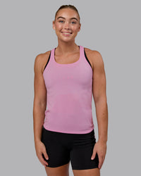 Woman wearing AeroFLX+ Seamless Tank - Pirouette/Bubblegum