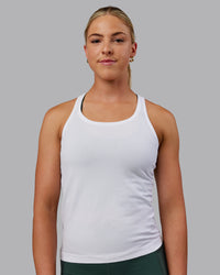 Woman wearing AeroFLX+ Seamless Tank - White | Thumbnail Index: 1