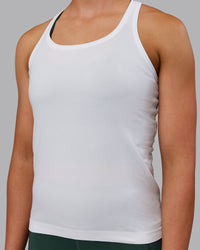 Woman wearing AeroFLX+ Seamless Tank - White | Thumbnail Index: 6