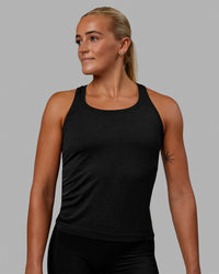 Woman wearing AeroFLX+ Seamless Tank - Black Marl