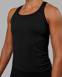 Woman wearing AeroFLX+ Seamless Tank - Black Marl