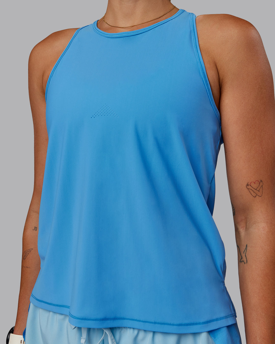 Woman wearing Cadence Tank - Azure Blue