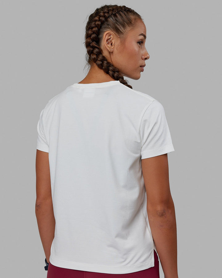 Woman wearing Deluxe PimaFLX Tee - Off White