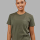 Woman wearing Deluxe PimaFLX Tee - Olive Fade