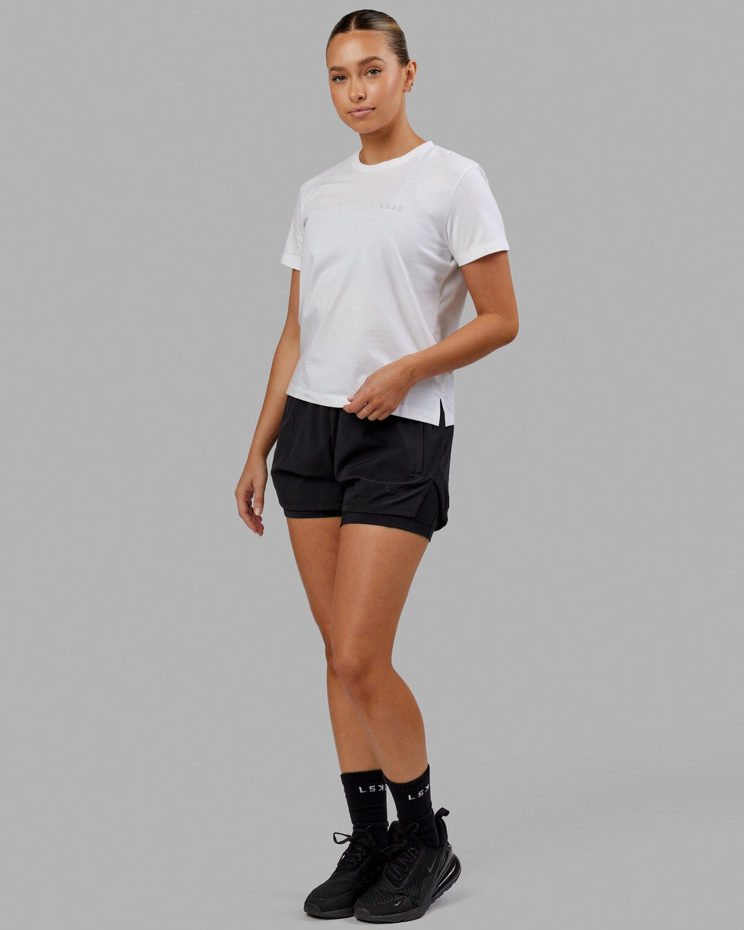 Woman wearing Deluxe PimaFLX Tee - White