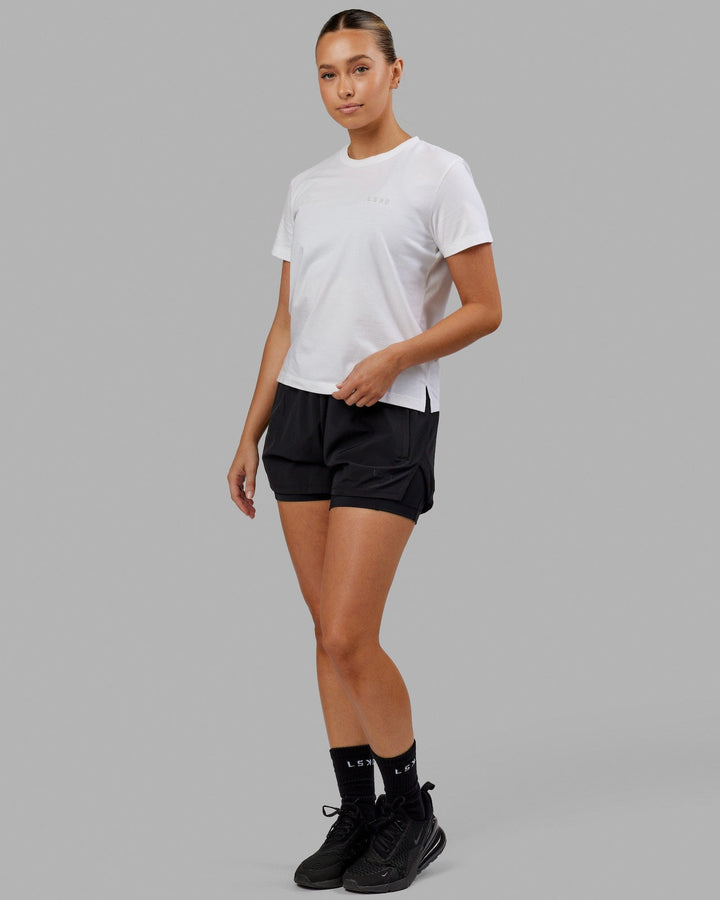 Woman wearing Deluxe PimaFLX Tee - White