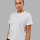 Woman wearing Deluxe PimaFLX Tee - White