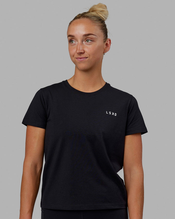 Woman wearing Endeavour FLX Cotton Tee - Black-White