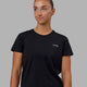 Woman wearing Endeavour FLX Cotton Tee - Black-White