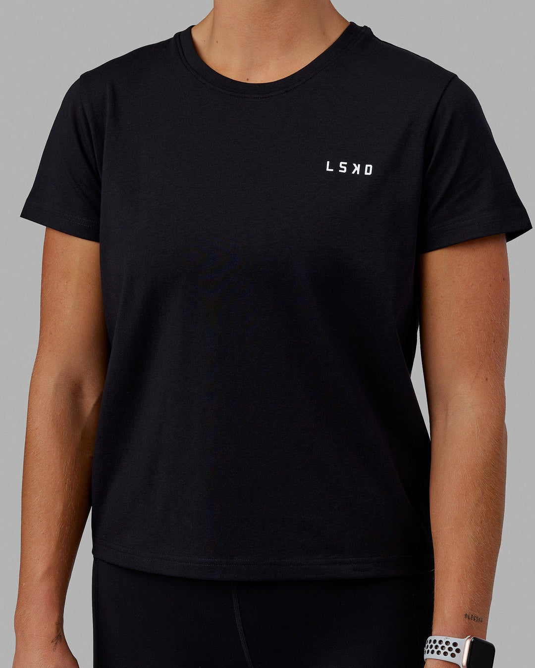 Woman wearing Endeavour FLX Cotton Tee - Black-White
