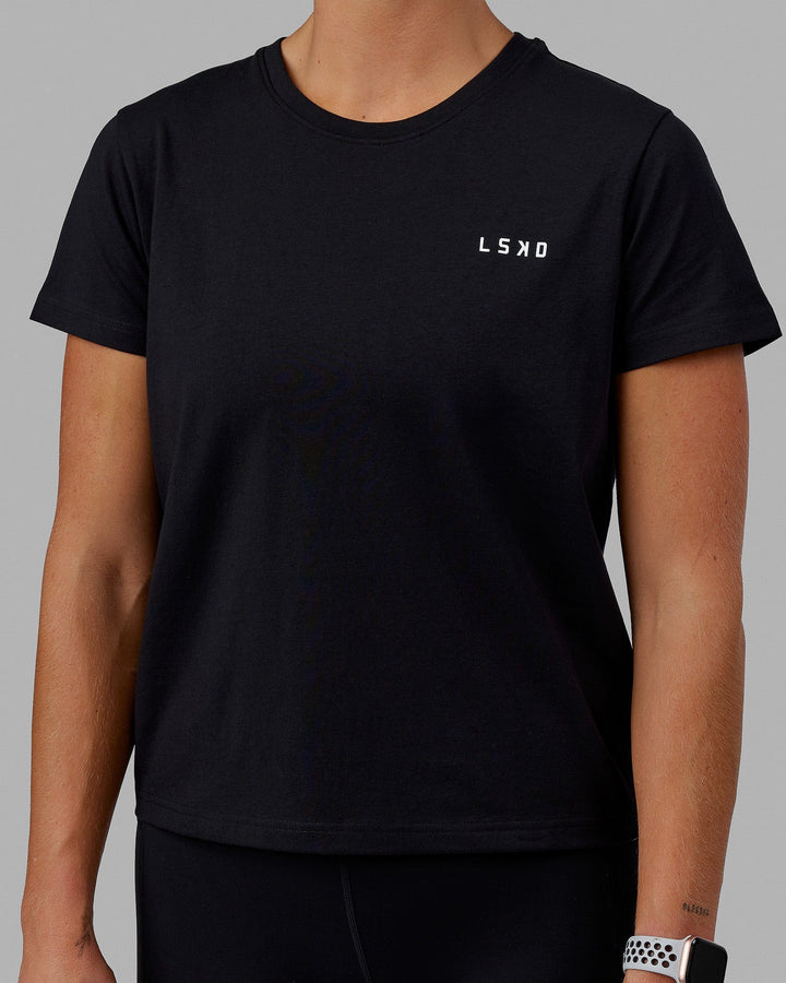 Woman wearing Endeavour FLX Cotton Tee - Black-White