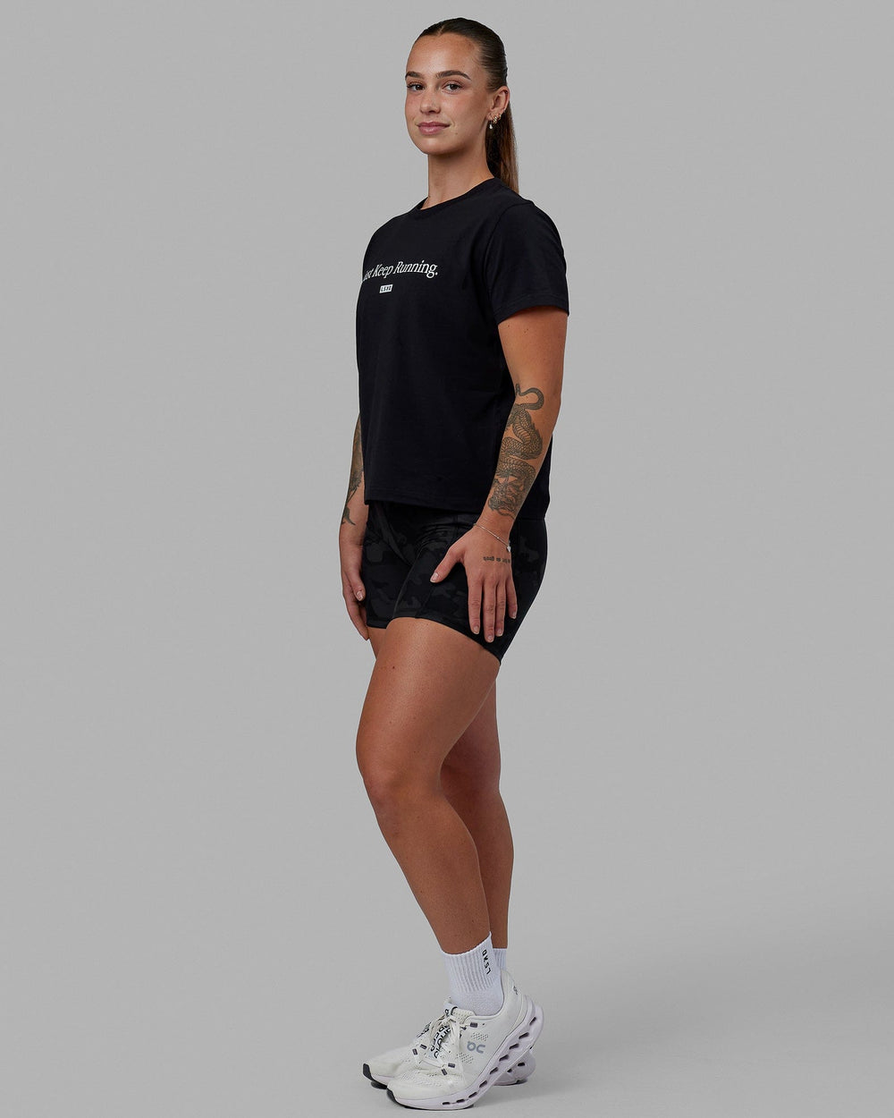 Woman wearing Just Keep Running FLXCotton Tee - Black-White