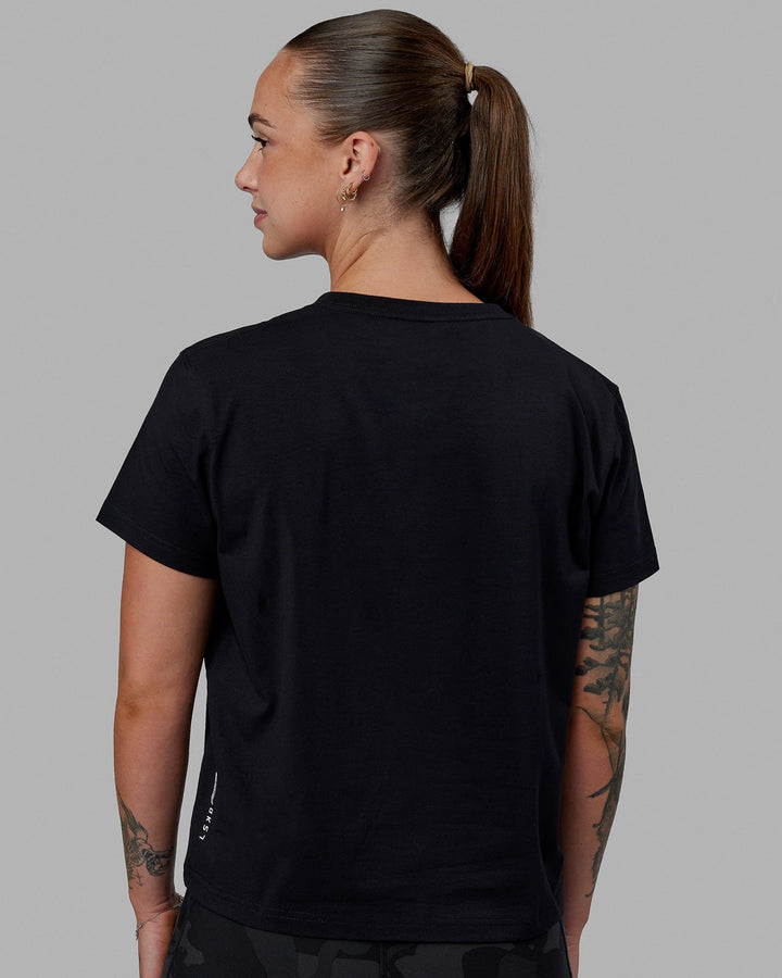Woman wearing Just Keep Running FLXCotton Tee - Black-White