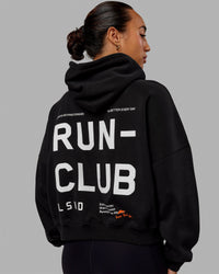 Woman wearing Love The Run Hoodie - Black