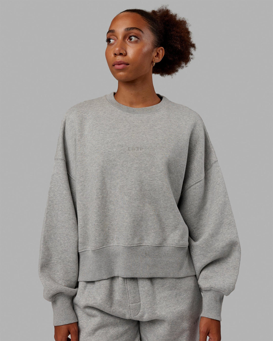 Woman wearing MVP Oversized Sweater - Light Grey Marl-Grey