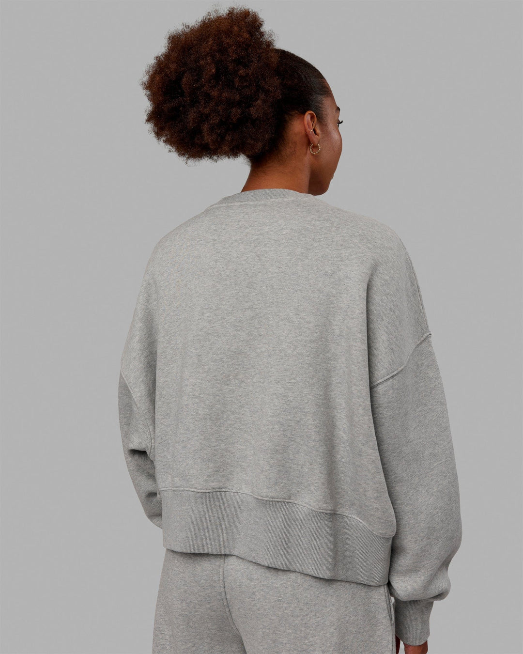 Woman wearing MVP Oversized Sweater - Light Grey Marl-Grey