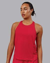Woman wearing Pace Running Tank - Scarlet