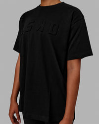 Woman wearing Stamped Heavyweight Oversized Tee - Black