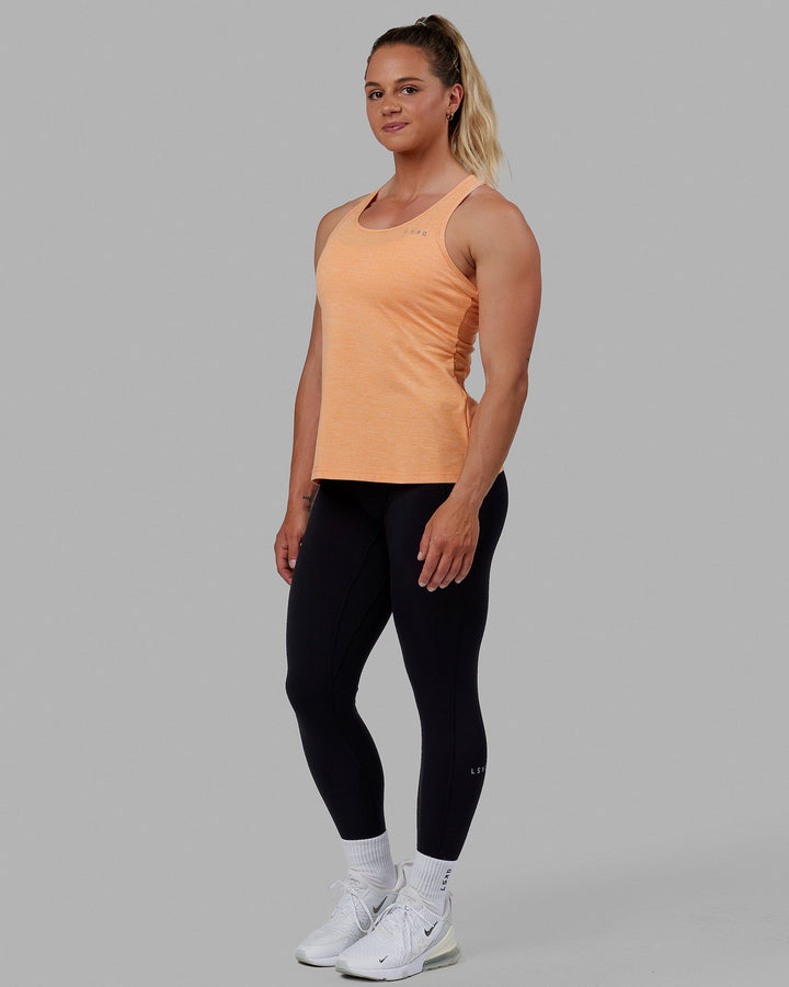 Woman wearing Perform VapourFLX Tank - Tangerine Marl