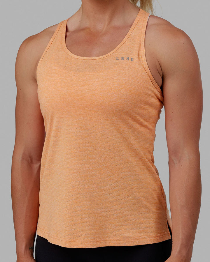 Woman wearing Perform VapourFLX Tank - Tangerine Marl
