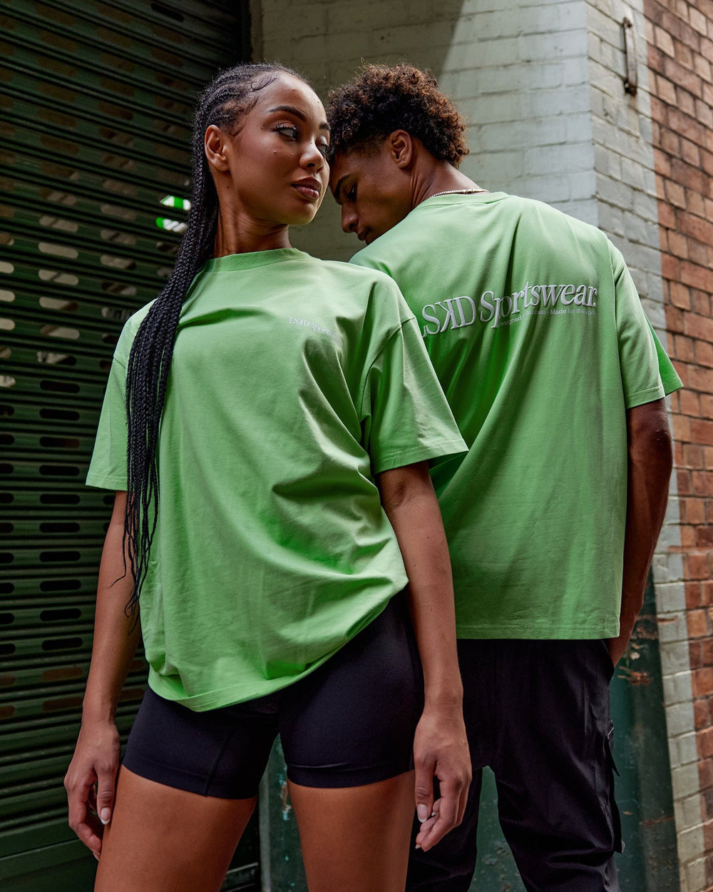 Duo wearing Unisex Motion FLXCotton Tee Oversize - Apple Mint