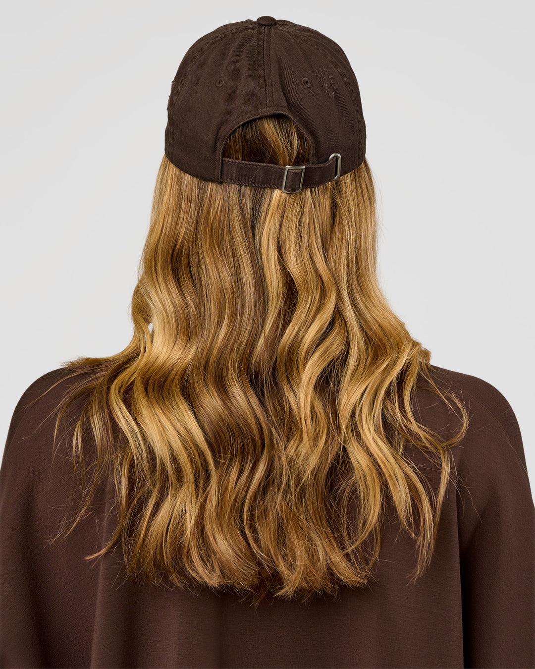 Woman wearing CF Move Through Cap - Hot Chocolate | Model:Leilani | Size:OS