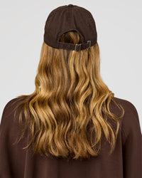 Woman wearing CF Move Through Cap - Hot Chocolate | Model:Leilani | Size:OS