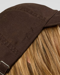 Woman wearing CF Move Through Cap - Hot Chocolate | Model:Leilani | Size:OS