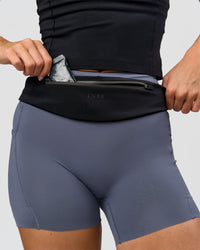 Woman wearing Pace Run Belt - Black-Reflective | Thumbnail Index: 3