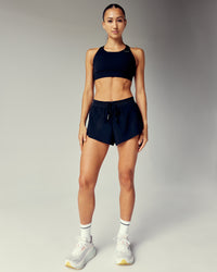 Woman wearing Accelerate 3" Running Short - Black | Model:Steph | Size:S