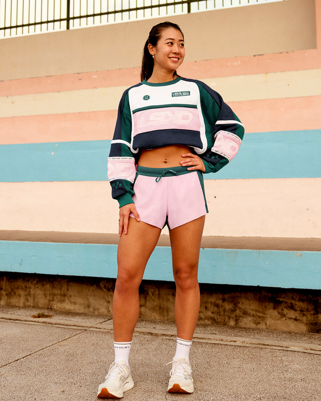 Woman wearing Accelerate 3" Mid-Rise Running Short - Transformative Teal-Marshmallow | Model:Vanessa | Size:S