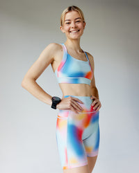 Woman wearing Advance Sports Bra - Rainbow Shade | Model:Karelia | Size:S