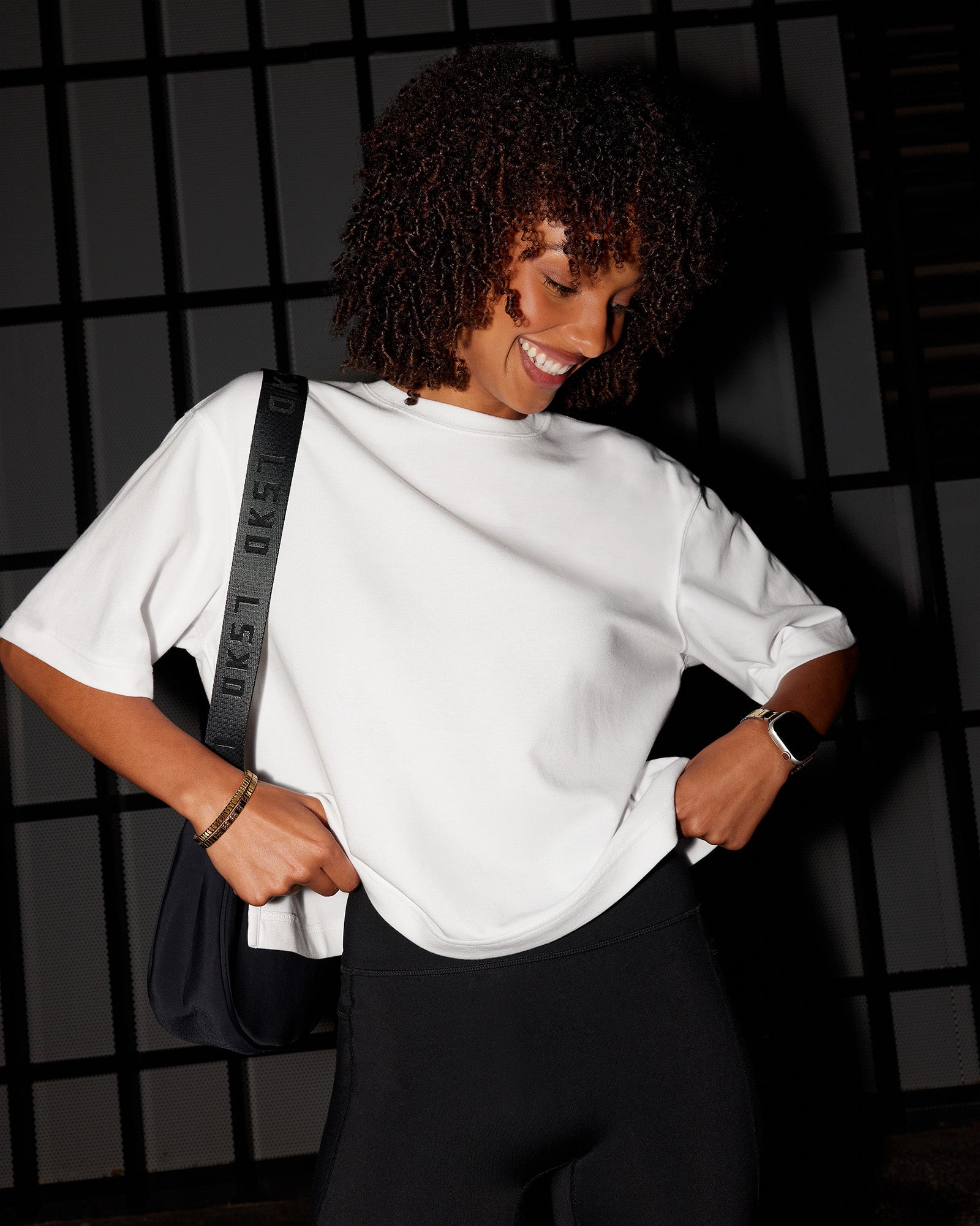 Woman wearing AfterDark ZeroCrease Cropped Tee - White | Model:Tomi | Size:S