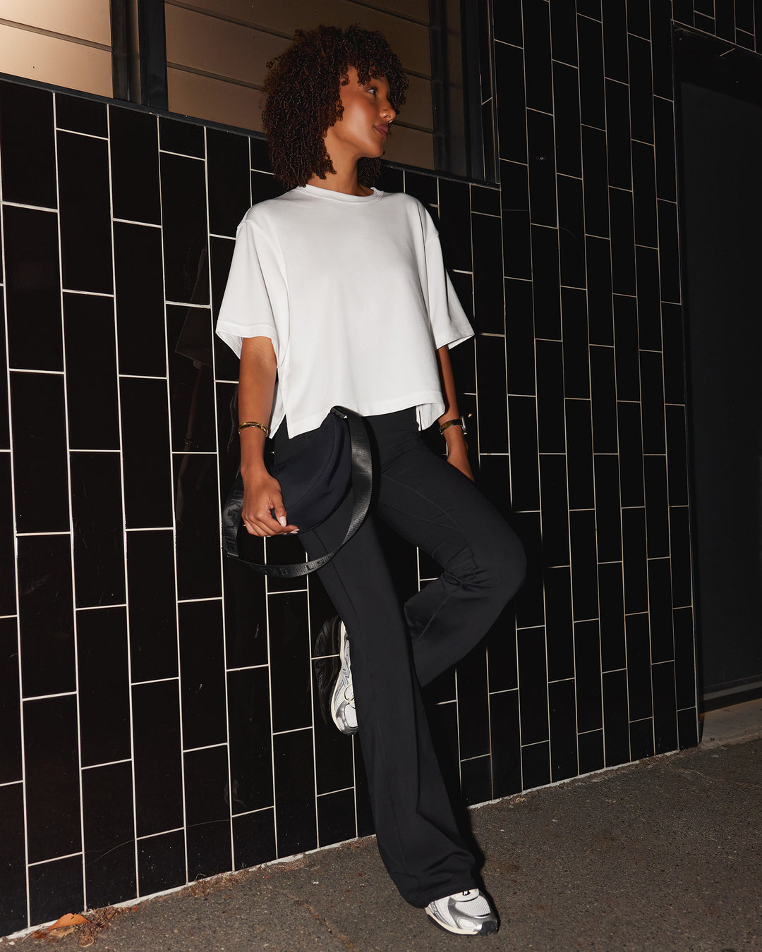 Woman wearing AfterDark ZeroCrease Cropped Tee - White | Model:Tomi | Size:S