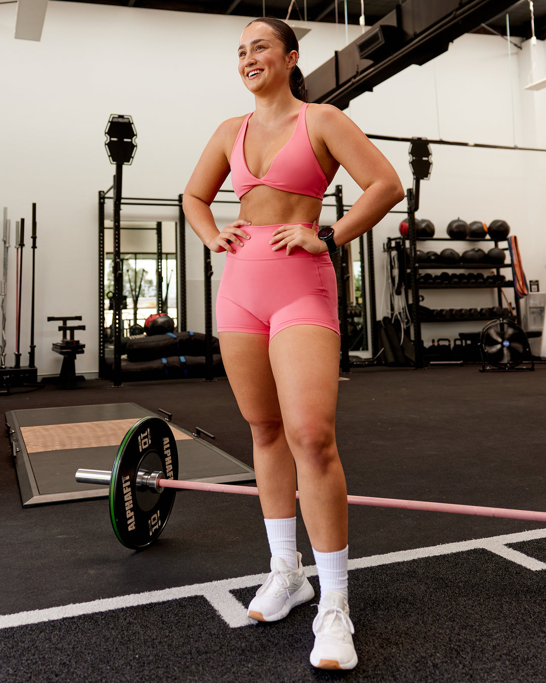 Woman wearing Agile Sports Bra - Pink Lemonade | Model:Charlotte | Size:S