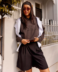Woman wearing All Day Active Knitted Hoodie - Dark Storm | Model:Kaye | Size:S