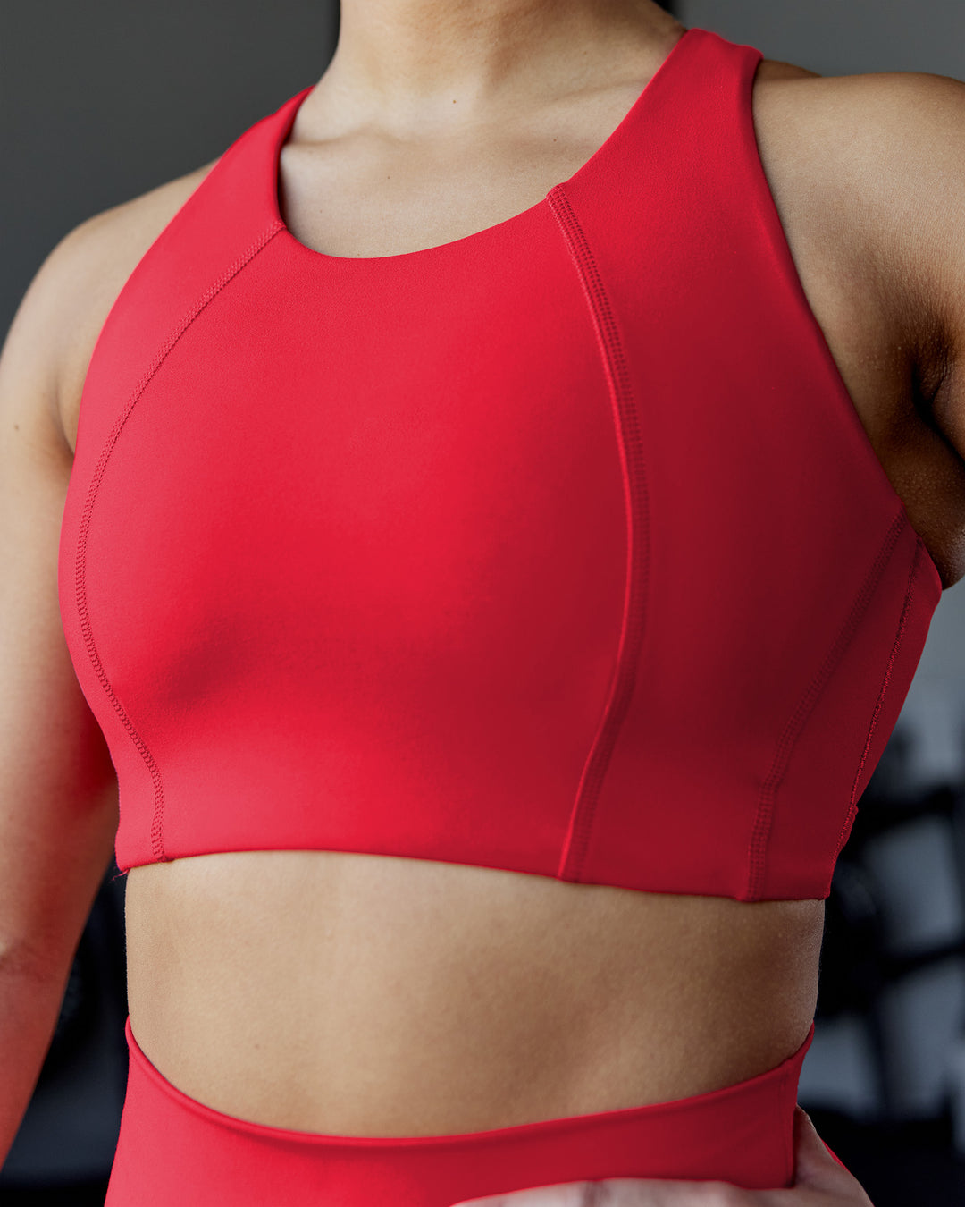Woman wearing Ascent Sports Bra - Scarlet | Model:Ayla | Size:S