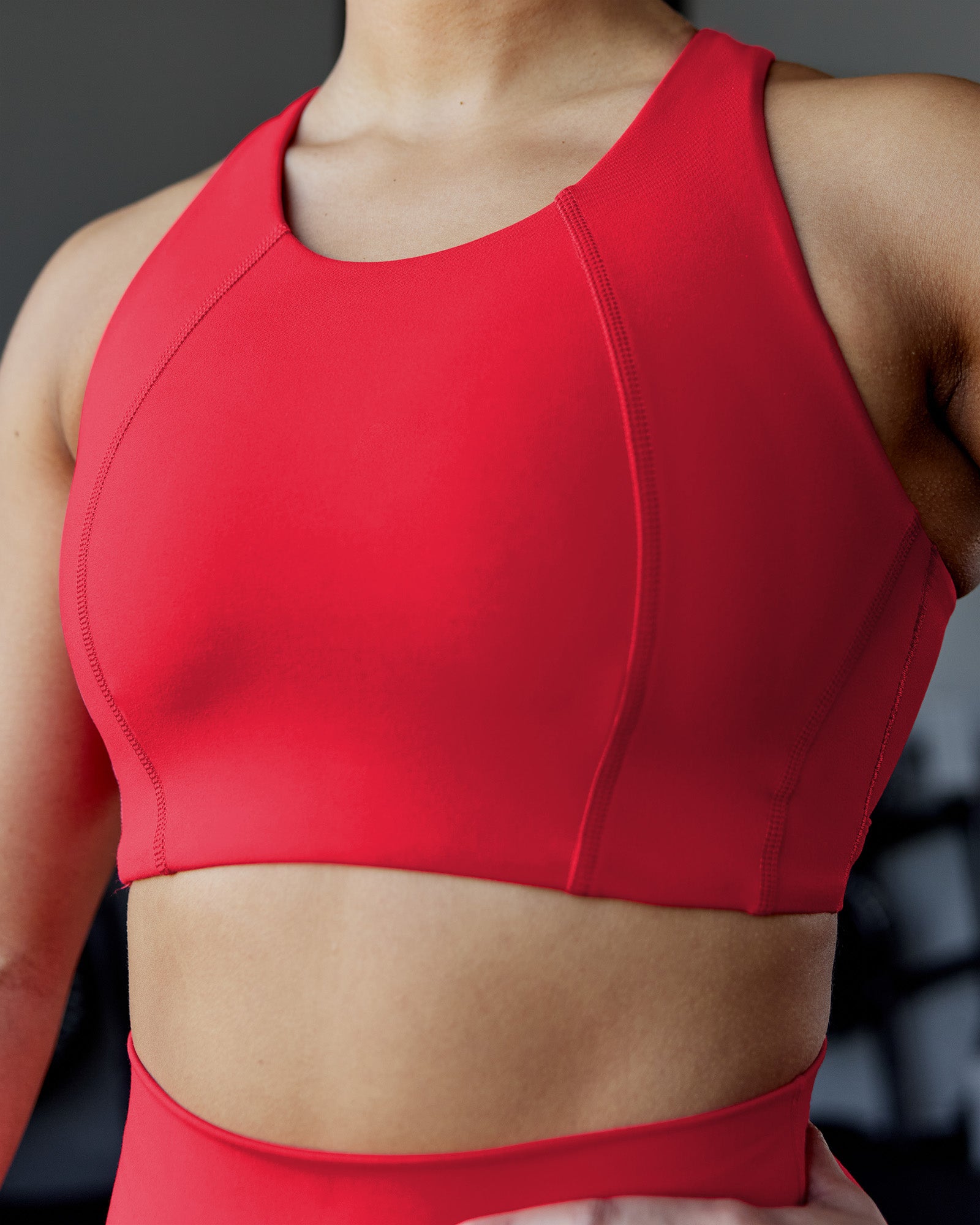 Woman wearing Ascent Sports Bra - Scarlet | Model:Ayla | Size:S