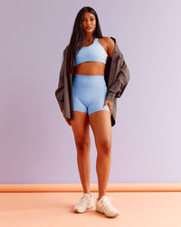 Woman wearing Aspire Sports Bra - Open Air | Model:Nikki | Size:S
