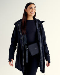 Woman wearing Auxiliary 2.0 Jacket - Black | Model:Ruby | Size:S