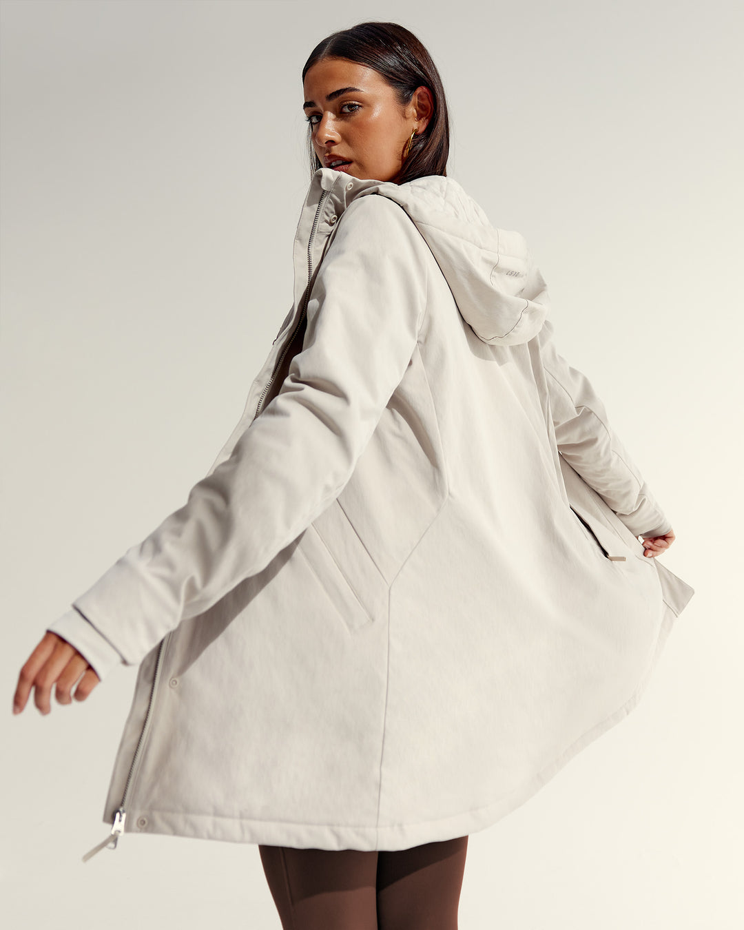 Woman wearing Auxiliary 2.0 Jacket - Shale Beige | Model:Ruby | Size:S