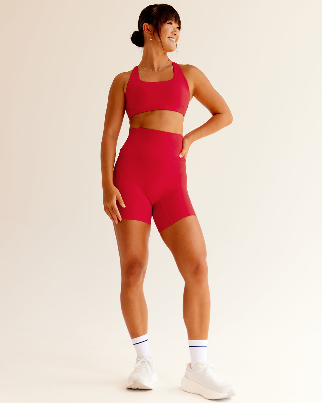 Woman wearing Elixir Ultra High-Rise 6&quot; Short Pockets - Flame | Size:S
