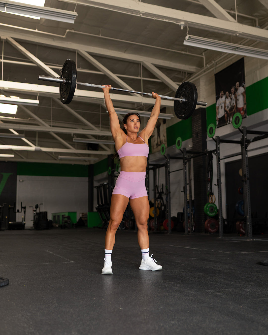 Woman wearing Enhance Ultra High-Rise 4&quot; Short - Pink Frosting | Model:Emily | Size:S