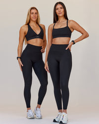 Woman wearing Fusion V-Contour Ultra High-Rise Full Length Legging Pockets - Black | Model:Both | Size:S